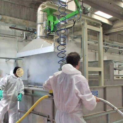 An INDEVA manipulator makes lthe use of a latex sprayer easy and effortless