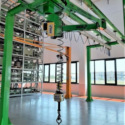 overhead mounted manipulator arm- Articulated arm sliding under overhead rails mounted on a  bridge crane structure